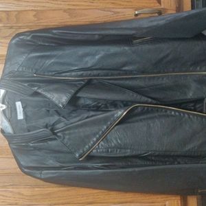 Calvin Klein Black leather with gold zippers